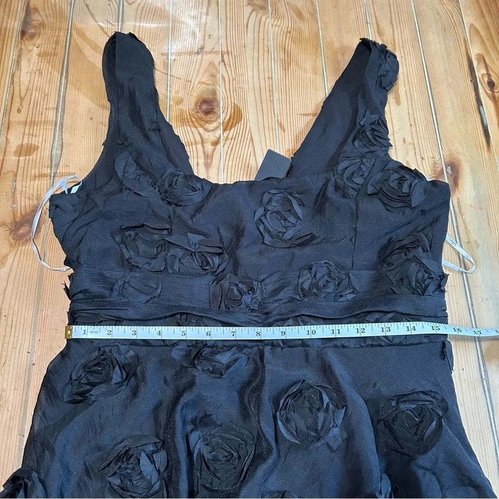 Exceptional Entrance Black Sleeveless Tiered Rosette Midi Dress - Picture 2 of 9